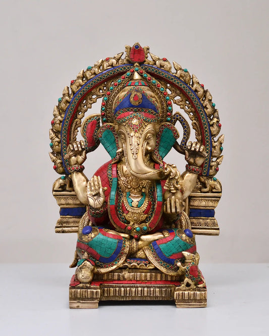 ब्रसौर™ प्रभावलि सहित बैठे भगवान गणेश | शुद्ध पीतल मीनाकारी जड़ाई के काम के साथ | ऊँचाई 19 इंच और वज़न 20 किलोग्राम