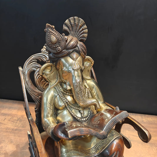 Brassaura® Brass Lord Ganesha Reading Book on Rocking Chair Statue | Handcrafted Ganesh Idol for Home Temple, Office & Study Room Décor | 23 Inches | 27 Kg