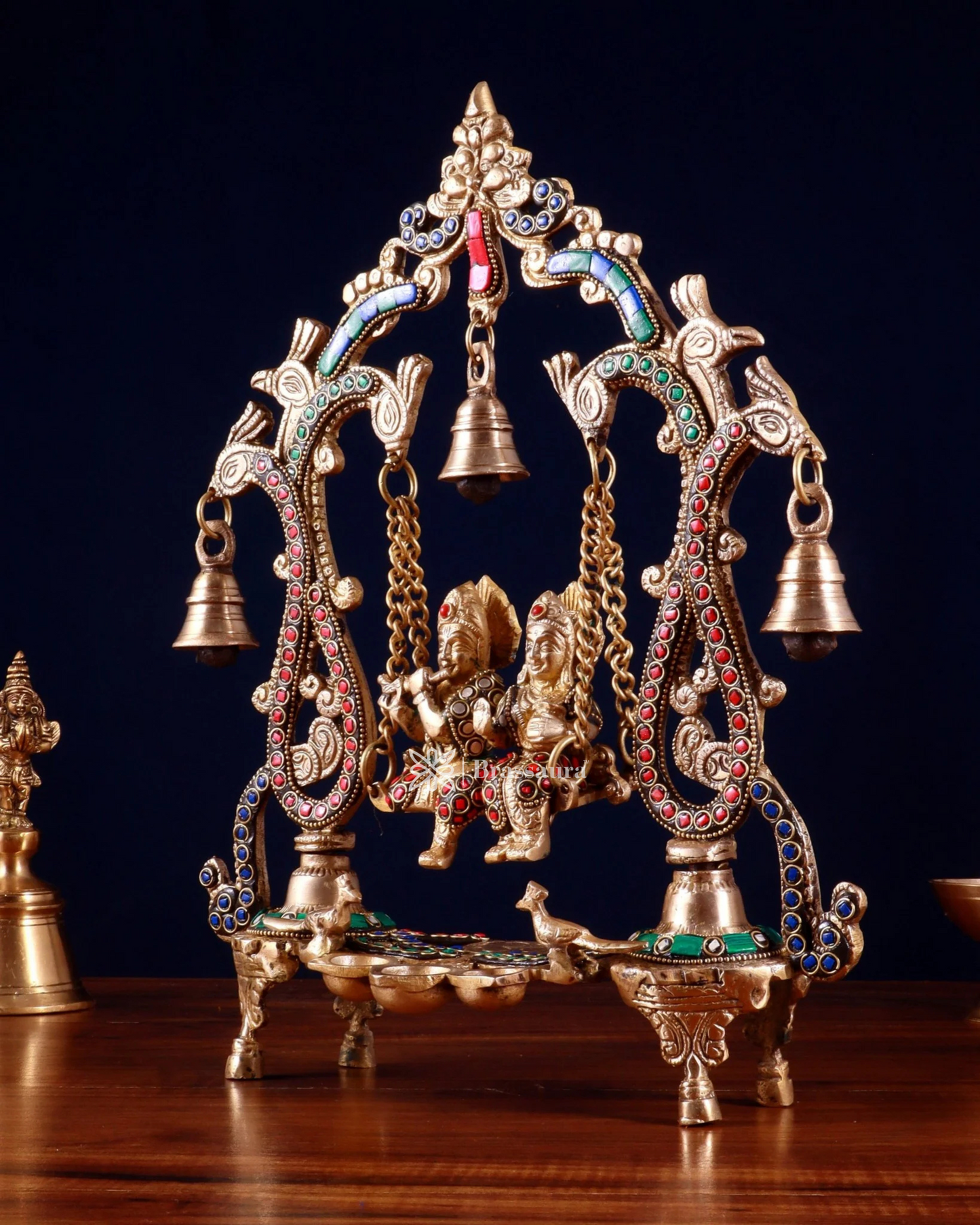 Brassaura™ Brass Radha Krishna Swing Idol with Diyas, Peacocks & Bells – Height 13.5 Inches & Weight 2.4 Kgs | Elegant Devotional Statue