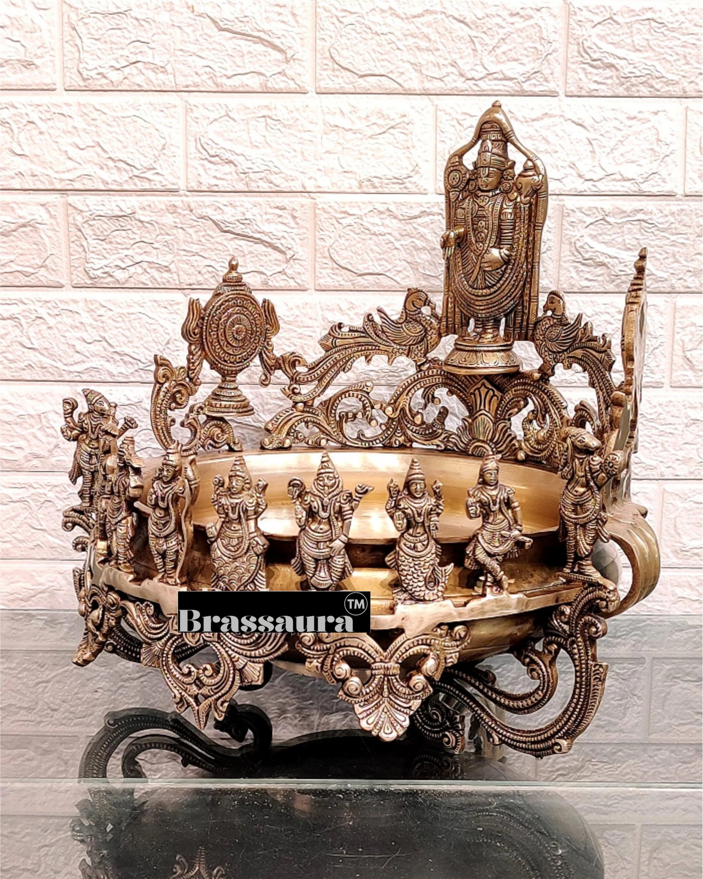 It's a large Traditional Urli with Lord tirupati balaji and 10 incarnations of Lord Vishnu. Material: Superfine Brass Height 16.5 inches Width 17 inches Depth 17 inches Weight 15 kgs