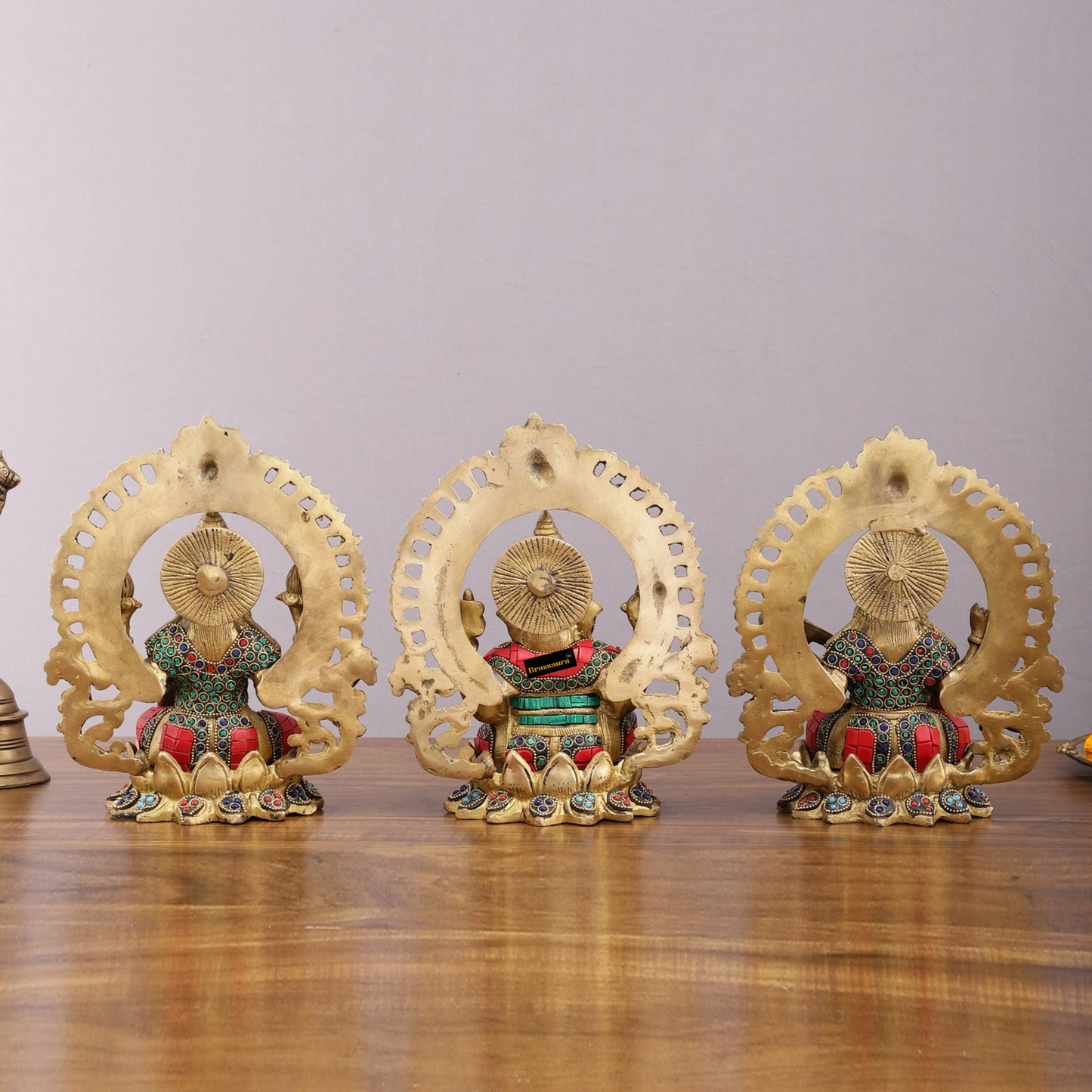 Brassaura™ Brass Ganesha, Lakshmi & Saraswati Idol Set – 9.5 Inch Height | 10.2 kg | Handcrafted with Meenakari Stonework