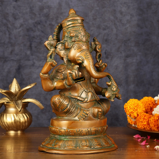 Brassaura® सुपरफाइन ब्रास गणेश मूर्ति – 12 इंच ऊंचाई | एंटीक ब्रॉन्ज़ फिनिश | गृह मंदिर के लिए दिव्य और कलात्मक मूर्ति