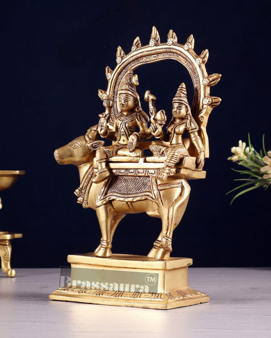 Brassaura® Shiv Parvati Seated on Nandi – Pradosha Nayagar Brass Statue with Prabhavali | 9 Inches Height