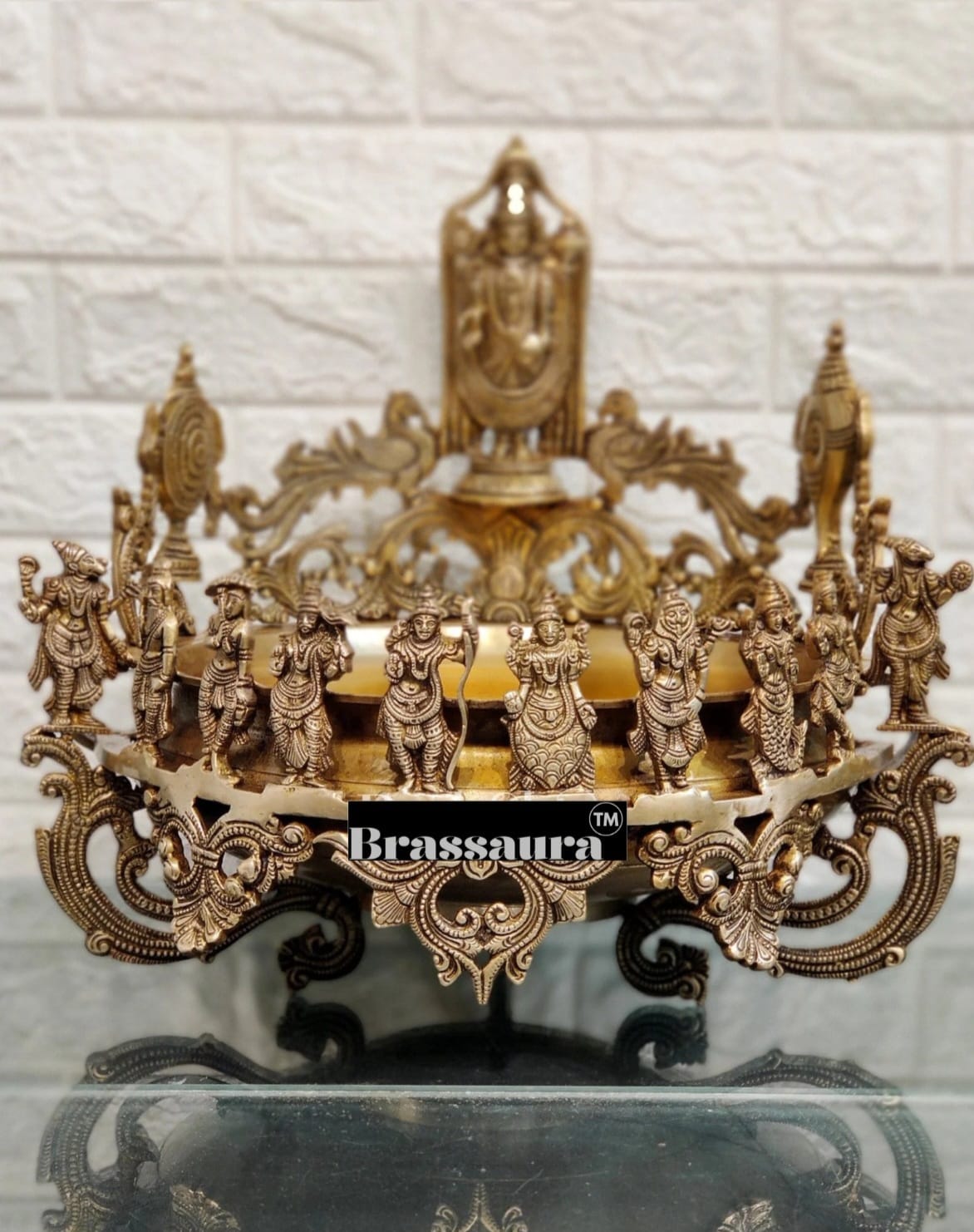 It's a large Traditional Urli with Lord tirupati balaji and 10 incarnations of Lord Vishnu. Material: Superfine Brass Height 16.5 inches Width 17 inches Depth 17 inches Weight 15 kgs