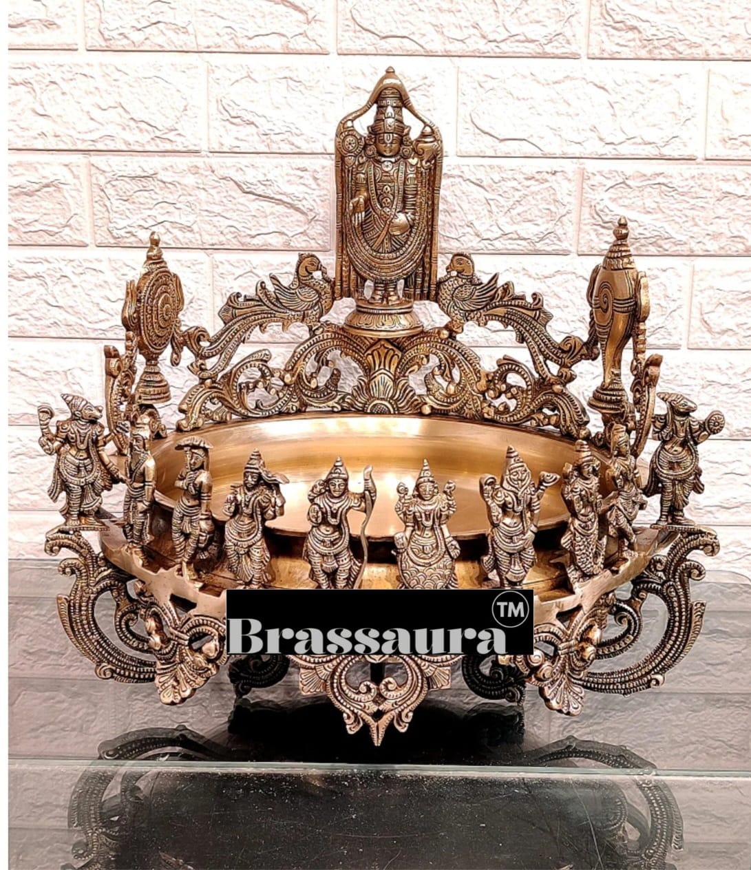 It's a large Traditional Urli with Lord tirupati balaji and 10 incarnations of Lord Vishnu. Material: Superfine Brass Height 16.5 inches Width 17 inches Depth 17 inches Weight 15 kgs
