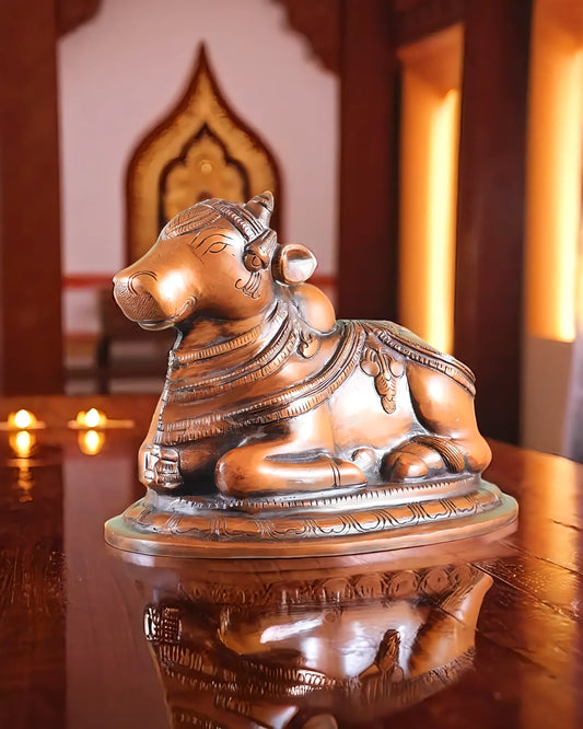 ब्रासौर™ हस्तनिर्मित पीतल नंदी प्रतिमा - कॉपर टोन | ऊंचाई 6" और वज़न 3.25 किलोग्राम
