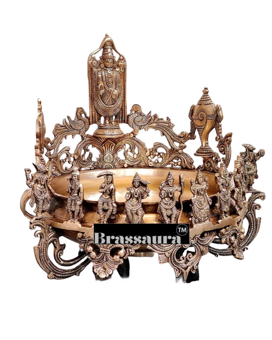 It's a large Traditional Urli with Lord tirupati balaji and 10 incarnations of Lord Vishnu. Material: Superfine Brass Height 16.5 inches Width 17 inches Depth 17 inches Weight 15 kgs