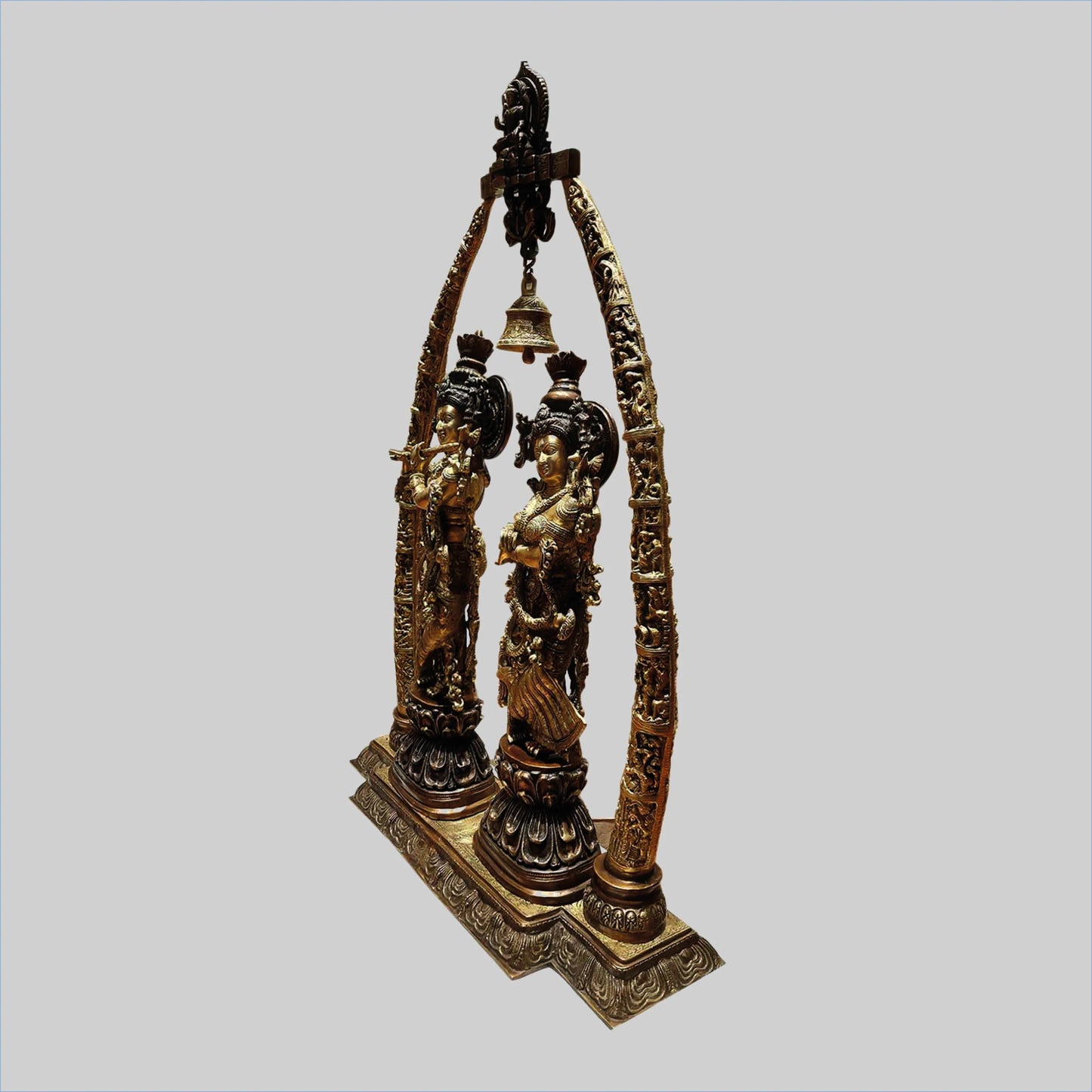 Brassaura® Radha Krishna Under Decorative Arch with Bell | Two-Tone Finish Brass Sculpture | Height 45 Inches & Weight 63 Kgs
