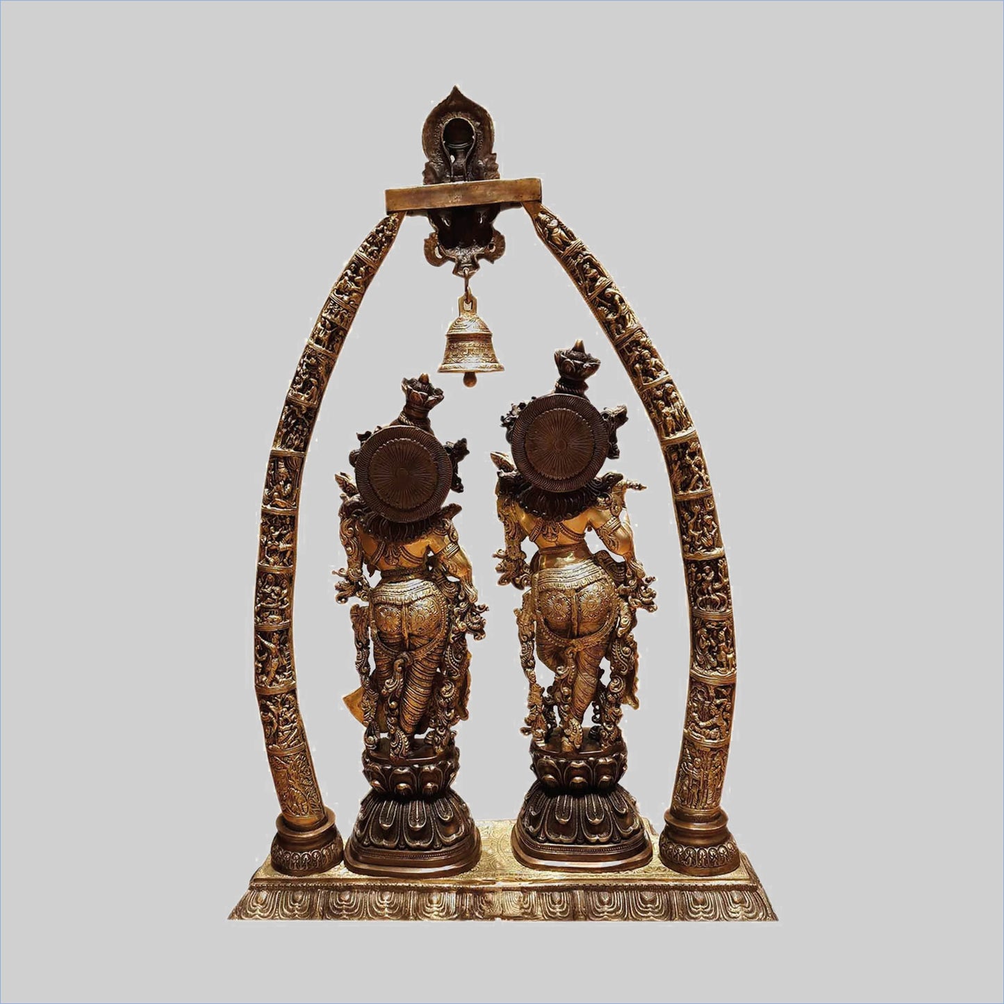 Brassaura® Radha Krishna Under Decorative Arch with Bell | Two-Tone Finish Brass Sculpture | Height 45 Inches & Weight 63 Kgs
