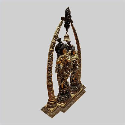 Brassaura® Radha Krishna Under Decorative Arch with Bell | Two-Tone Finish Brass Sculpture | Height 45 Inches & Weight 63 Kgs