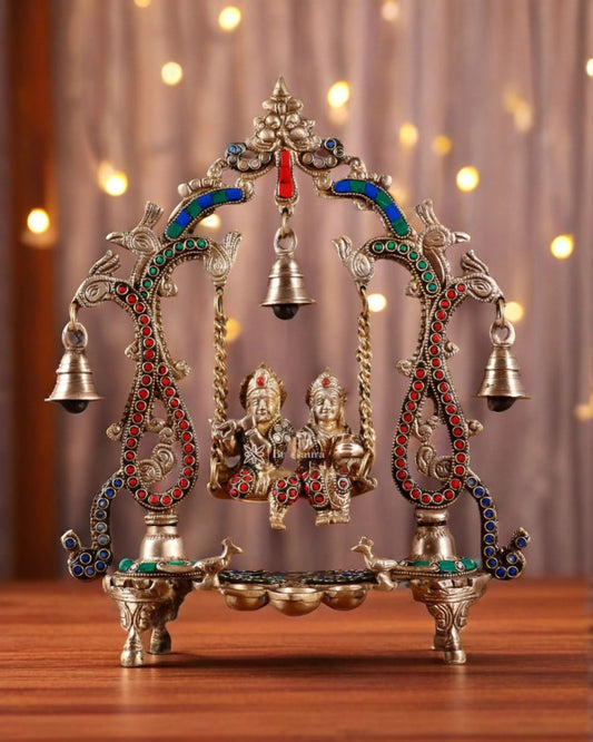 Brassaura™ Brass Radha Krishna Swing Idol with Diyas, Peacocks & Bells – Height 13.5 Inches & Weight 2.4 Kgs | Elegant Devotional Statue