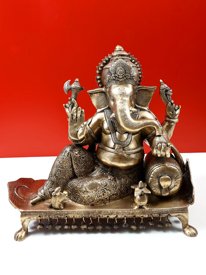 ब्रासौर्रा™ चौकी पर लेटे भगवान गणेश | शुद्ध पीतल की बैठी हुई मूर्ति | ऊंचाई 16 इंच