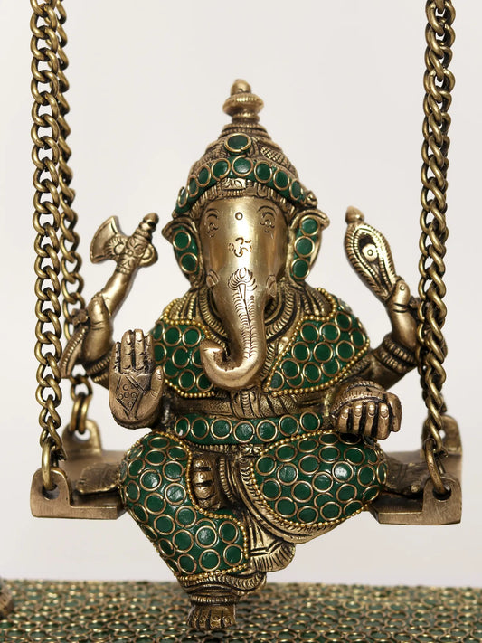 ब्रासौहरा® झूले वाले गणेश (नक्काशीदार खंभों के साथ) | शुद्ध पीतल से निर्मित और इसमें मीनाकारी का काम किया गया है | ऊँचाई 16 इंच और वज़न 6.94 किलोग्राम