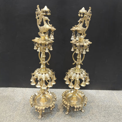 Brassaura® Brass Peacock Multi-Tier Oil Lamp Set of 2 | Traditional Decorative Deepam Diya Stand with Hanging Bells for Home Temple, Pooja & Spiritual Décor | 34 Inches | 21 Kg