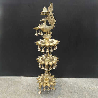 Brassaura® Traditional Brass Peacock Multi-Tier Oil Lamp | Decorative Deepam Diya Stand with Hanging Bells for Home Temple, Pooja & Spiritual Décor | 49 Inches | 26 Kg