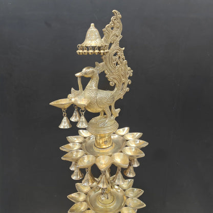 Brassaura® Traditional Brass Peacock Multi-Tier Oil Lamp | Decorative Deepam Diya Stand with Hanging Bells for Home Temple, Pooja & Spiritual Décor | 49 Inches | 26 Kg