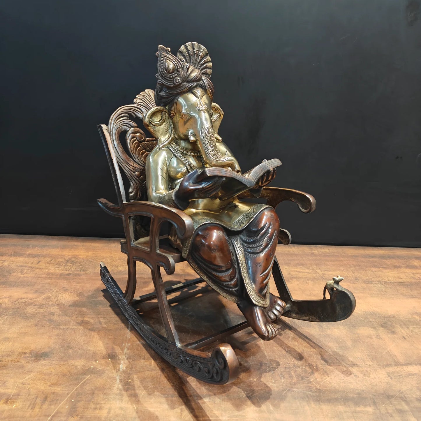 Brassaura® Brass Lord Ganesha Reading Book on Rocking Chair Statue | Handcrafted Ganesh Idol for Home Temple, Office & Study Room Décor | 23 Inches | 27 Kg