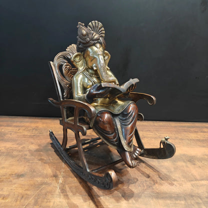 Brassaura® Brass Lord Ganesha Reading Book on Rocking Chair Statue | Handcrafted Ganesh Idol for Home Temple, Office & Study Room Décor | 23 Inches | 27 Kg