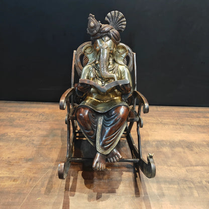 Brassaura® Brass Lord Ganesha Reading Book on Rocking Chair Statue | Handcrafted Ganesh Idol for Home Temple, Office & Study Room Décor | 23 Inches | 27 Kg