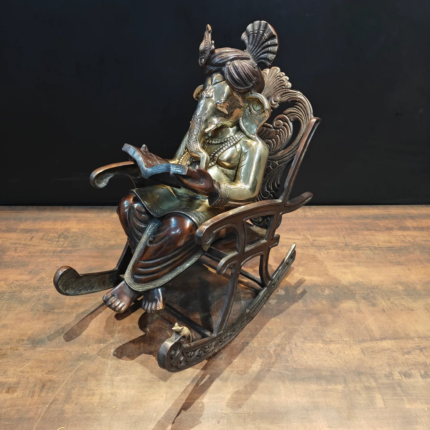 Brassaura® Brass Lord Ganesha Reading Book on Rocking Chair Statue | Handcrafted Ganesh Idol for Home Temple, Office & Study Room Décor | 23 Inches | 27 Kg