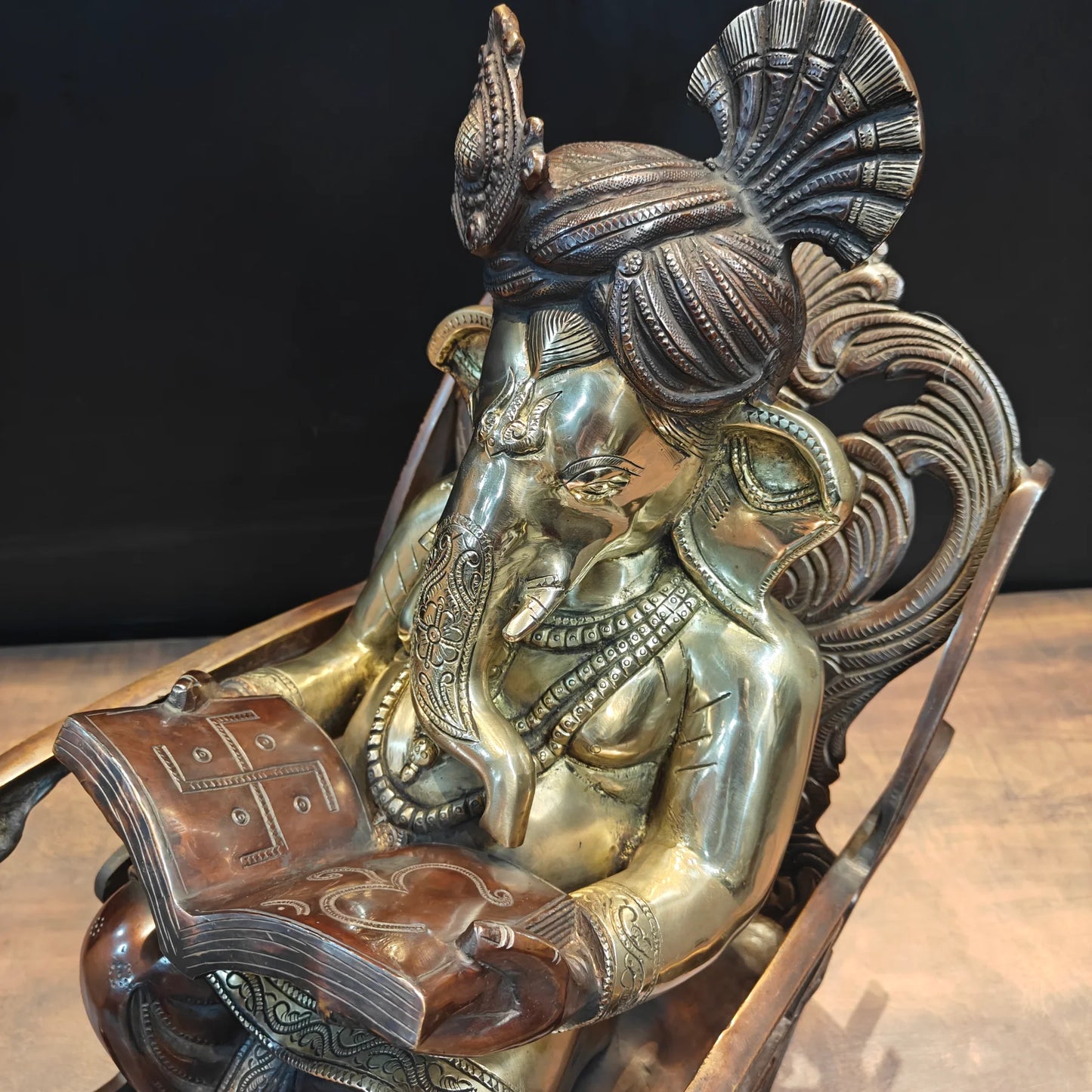Brassaura® Brass Lord Ganesha Reading Book on Rocking Chair Statue | Handcrafted Ganesh Idol for Home Temple, Office & Study Room Décor | 23 Inches | 27 Kg
