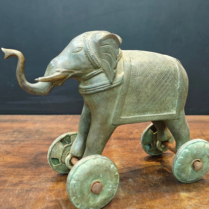 Brassaura® Brass Elephant on Wheels Statue | Handcrafted Vintage Pull Elephant Showpiece | Traditional Brass Home Décor, Vastu & Collectible Artifact | 10 Inches | 9 Kg