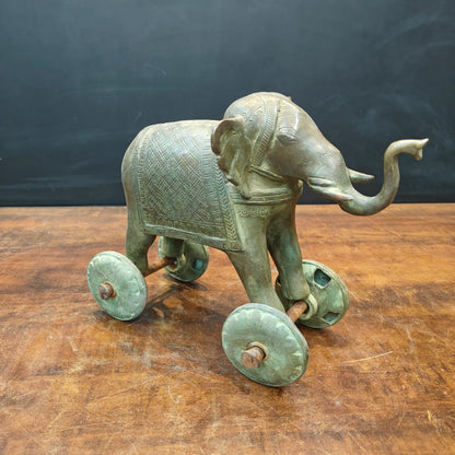 Brassaura® Brass Elephant on Wheels Statue | Handcrafted Vintage Pull Elephant Showpiece | Traditional Brass Home Décor, Vastu & Collectible Artifact | 10 Inches | 9 Kg