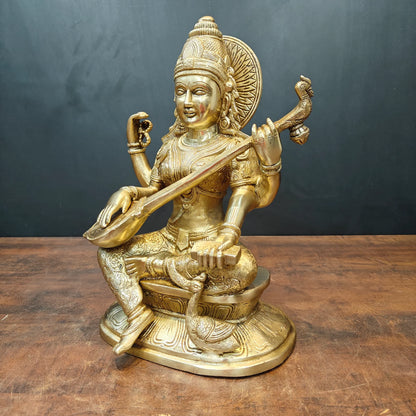 Brassaura® Brass Goddess Saraswati Statue | Seated Maa Saraswati Idol with Veena | Divine Brass Sculpture for Knowledge, Wisdom & Home Temple Décor | 15 Inches | 13 Kg