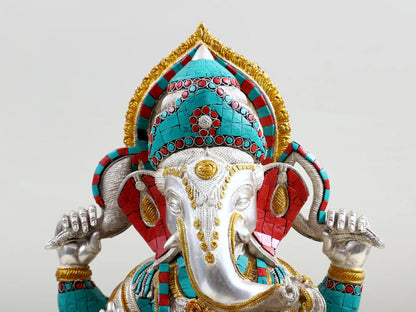 ब्रासौर™ चार भुजाओं वाले बैठे भगवान गणेश | उत्तम जड़ाई के काम के साथ सिल्वर फिनिश ब्रास | ऊंचाई 18 इंच और वज़न 17 किलोग्राम
