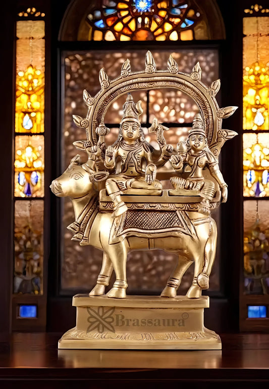 rassaura™ Shiv Parvati Seated on Nandi – Pradosha Nayagar Brass Statue with Prabhavali | 9 Inches Height, 2.25 Kgs Weight