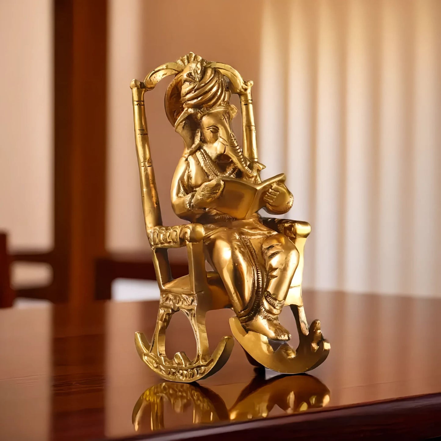 Brassaura® Brass Ganesha on Rocking Chair Reading Mahabharata | Height 7.5 Inches