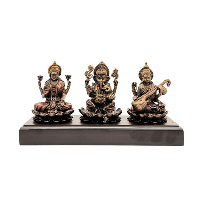 Resin Laxmi Ganesha Sarsawati Statue for Home and Decor And Gift Show Piece for Living Room Weight .9 Kg Height 12 cm