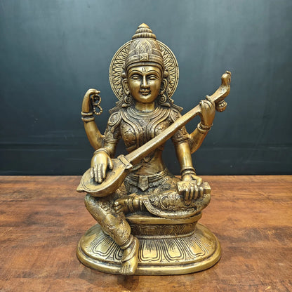 Brassaura® Brass Goddess Saraswati Statue | Handcrafted Premium Brass Saraswati Murti for Home Temple, Pooja & Spiritual Décor | Antique Brass Finish | 15 Inches | 13 Kg