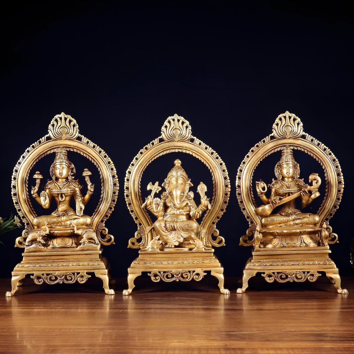 Brassaura™ Brass Lakshmi Ganesha Saraswati Idol Set with Prabhavali Frame | Pure Brass Handcrafted Trio | Height 13 Inches & Total Weight 18 Kgs