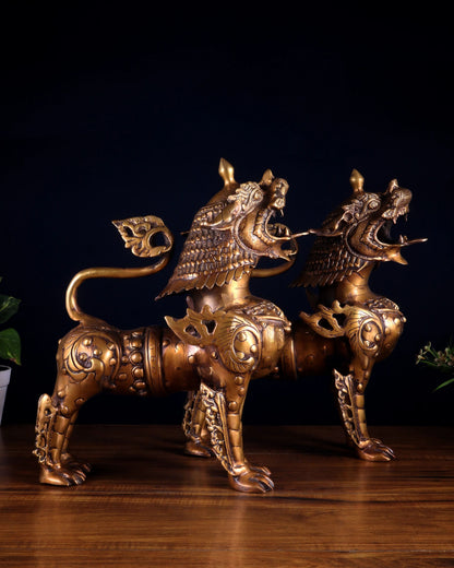 Brassaura™ Pair of Tibetan Snow Lion Statues in Vintage Brass | Handcrafted Himalayan Décor | Total Weight 40 Kgs | Height 14.5 Inches