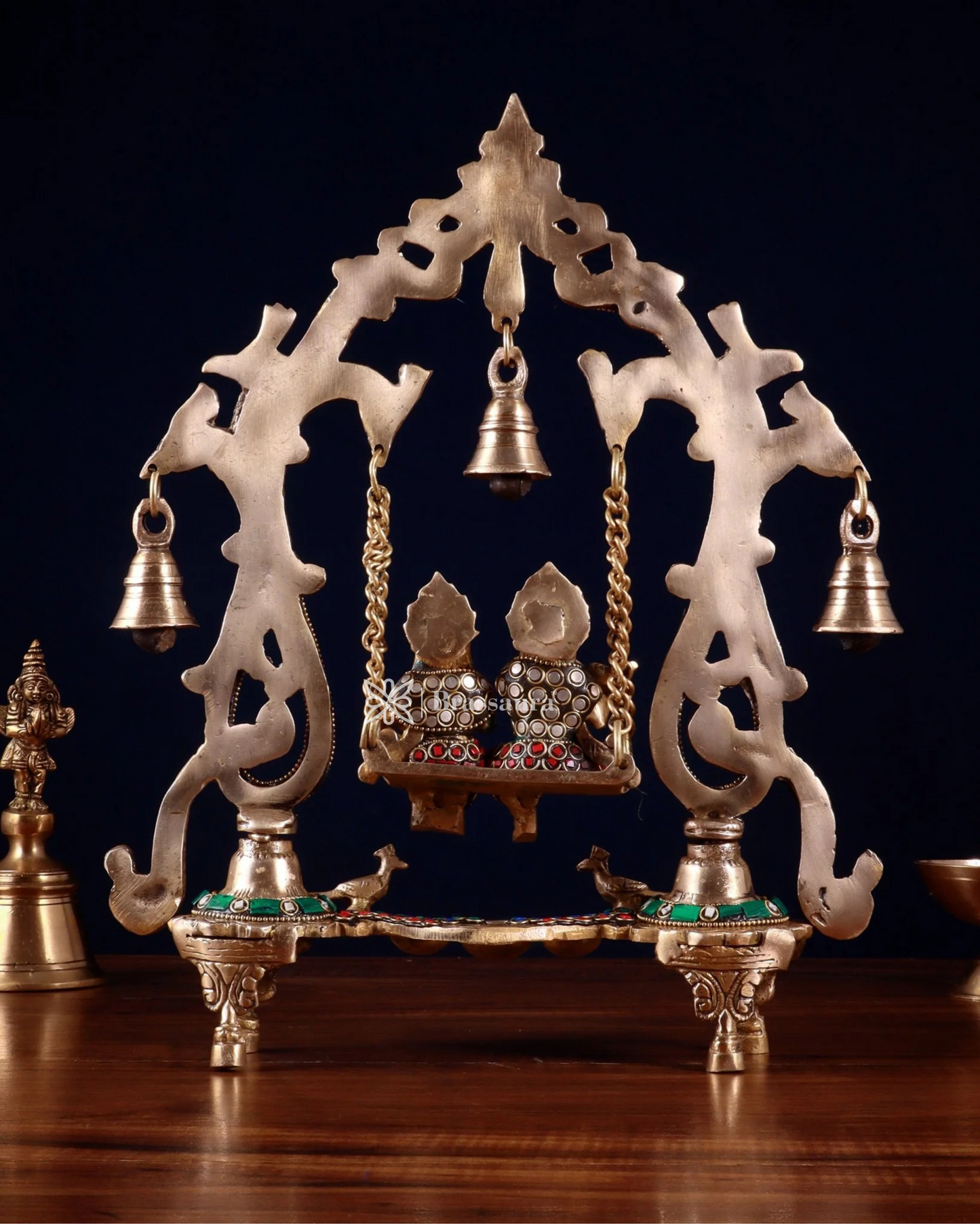 Brassaura™ Brass Radha Krishna Swing Idol with Diyas, Peacocks & Bells – Height 13.5 Inches & Weight 2.4 Kgs | Elegant Devotional Statue