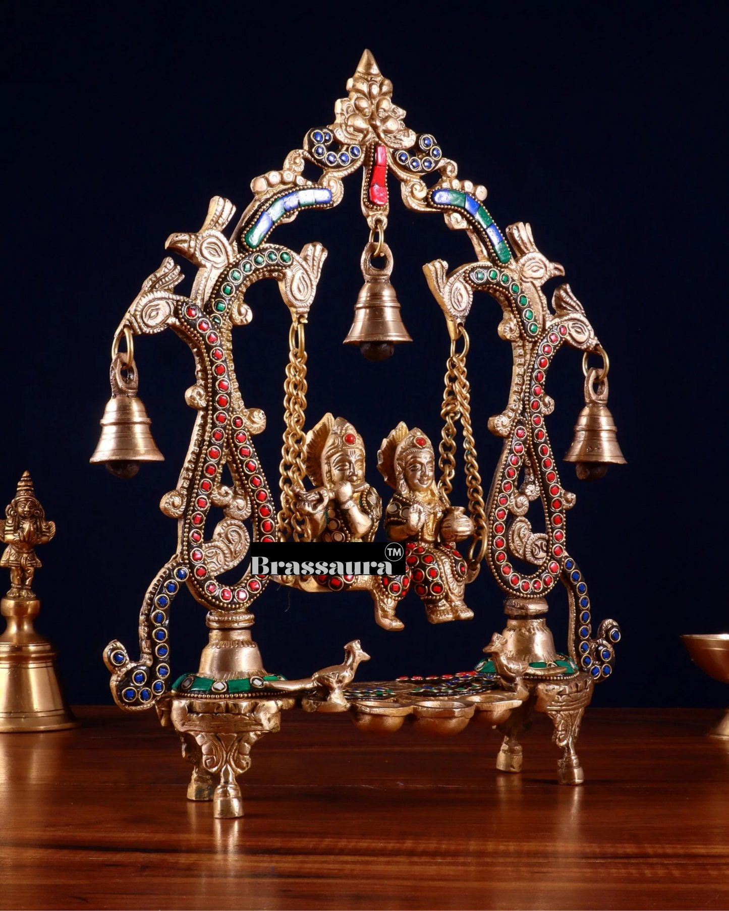Brassaura™ Brass Radha Krishna Swing Idol with Diyas, Peacocks & Bells – Height 13.5 Inches & Weight 2.4 Kgs | Elegant Devotional Statue