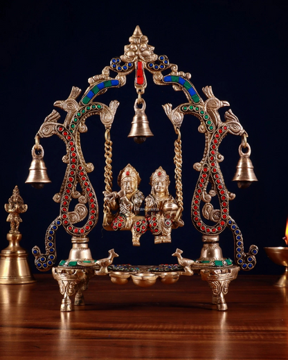 Brassaura™ Brass Radha Krishna Swing Idol with Diyas, Peacocks & Bells – Height 13.5 Inches & Weight 2.4 Kgs | Elegant Devotional Statue