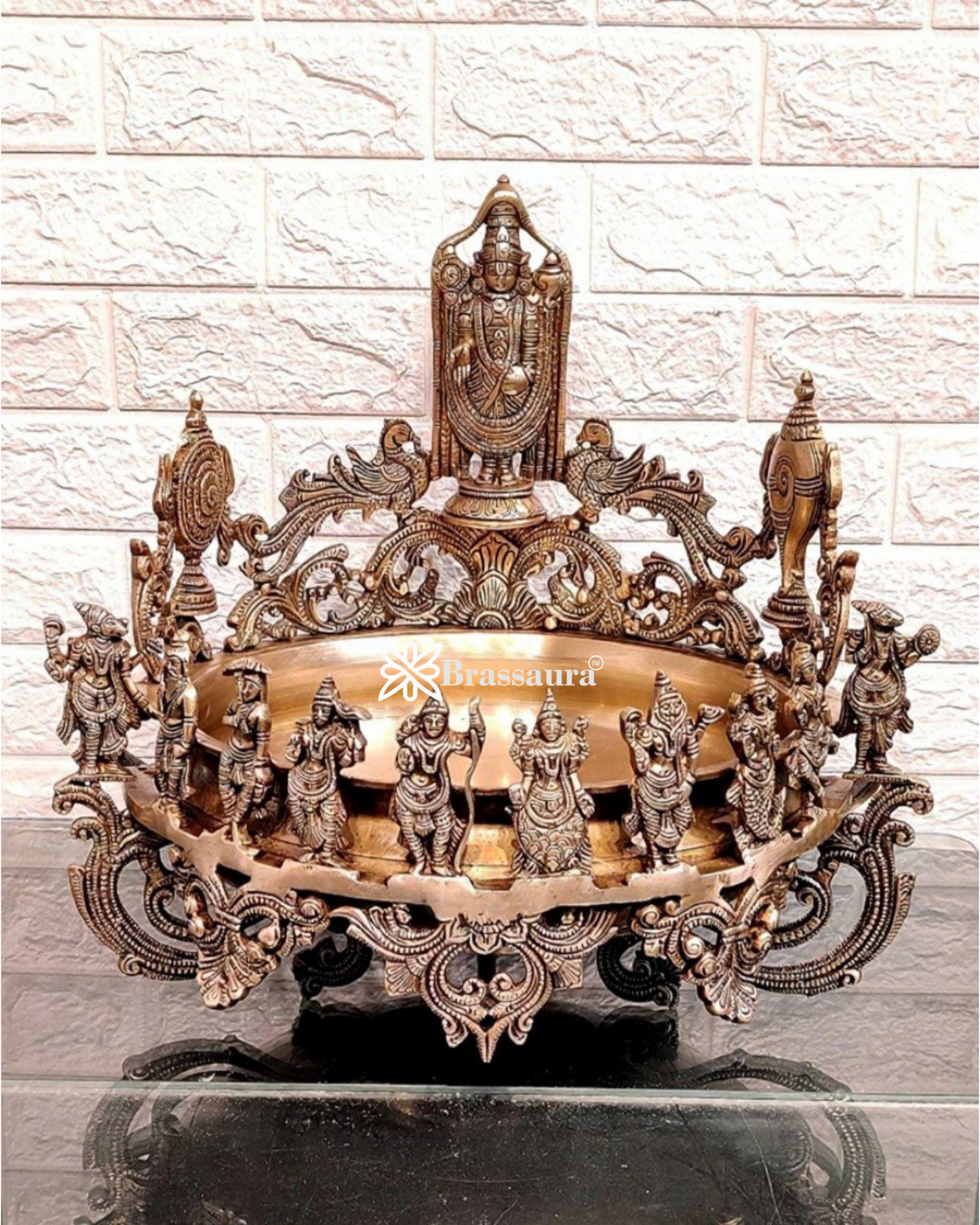 It's a large Traditional Urli with Lord tirupati balaji and 10 incarnations of Lord Vishnu. Material: Superfine Brass Height 16.5 inches Width 17 inches Depth 17 inches Weight 15 kgs