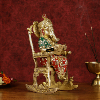 Brassaura™ Pure Brass Reading Ganesha on Rocking Chair – Height 11 Inches, Weight 3.5 Kgs | Meenakari Art
