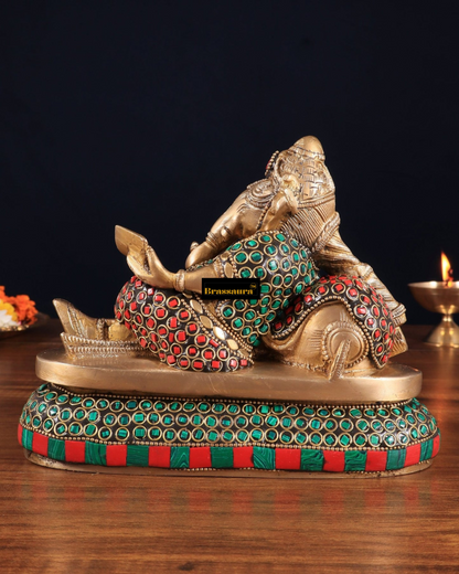 Brassaura™ Handcrafted Brass Ganapathi on Peacock Throne – 7.5" Height, 4.5 kg – Adorned with Multicolored Stones