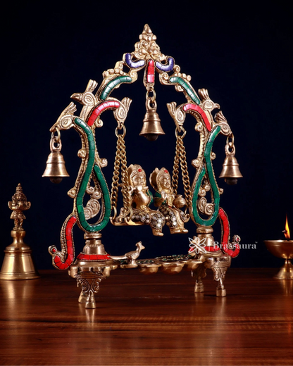 Brassaura™ Brass Radha Krishna Swing Idol with Diyas, Peacocks & Bells – Height 13.5 Inches & Weight 2.4 Kgs | Elegant Devotional Statue