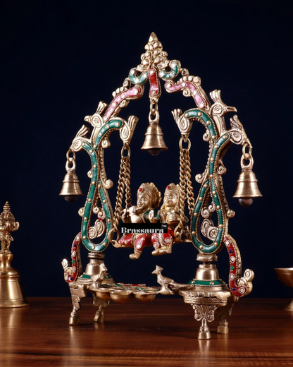 Brassaura™ Brass Radha Krishna Swing Idol with Diyas, Peacocks & Bells – Height 13.5 Inches & Weight 2.4 Kgs | Elegant Devotional Statue