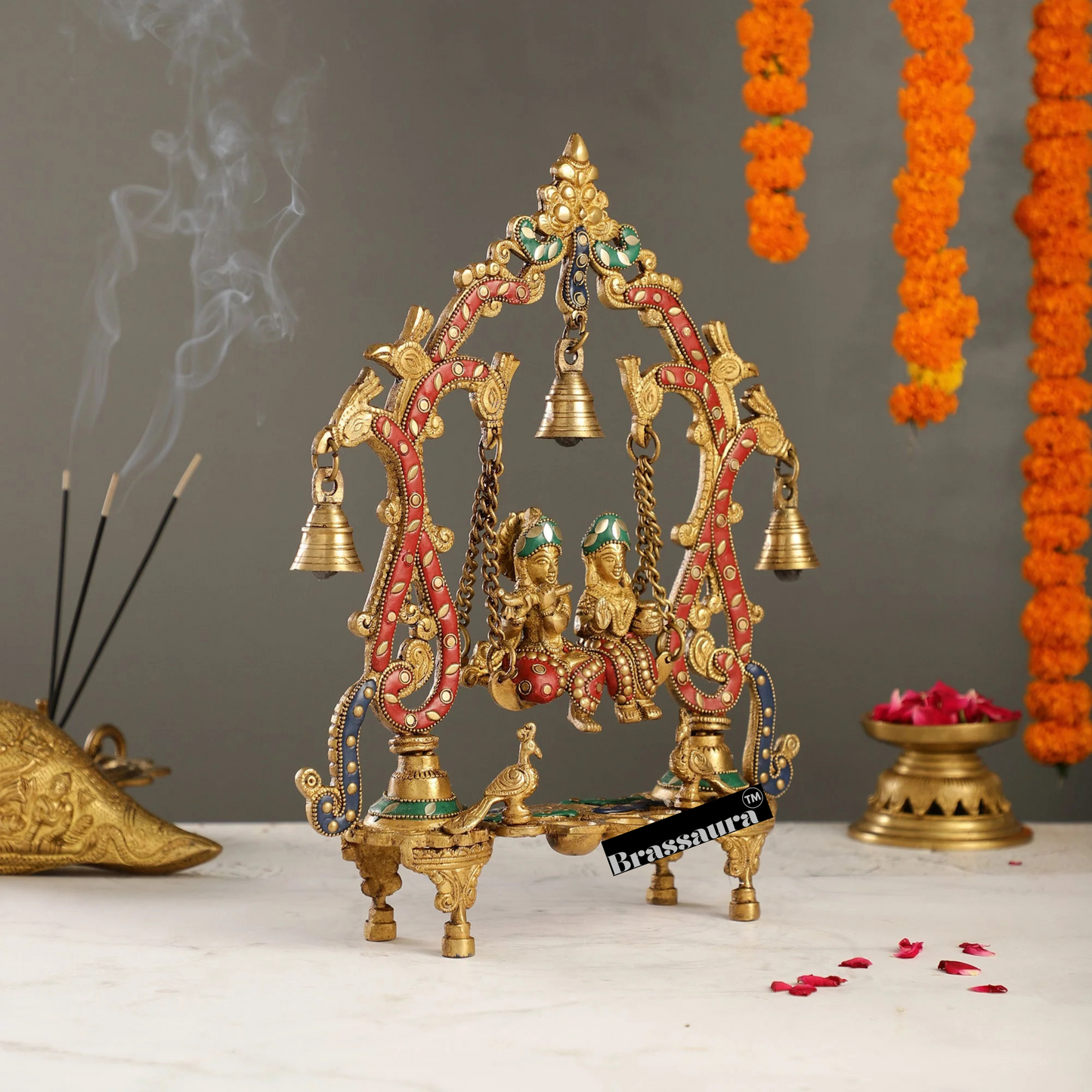 Brassaura™ Brass Radha Krishna on Swing with Diyas, Peacocks & Bells – Height 13.5 Inches & Weight 2.4 Kgs | Elegant Devotional Idol