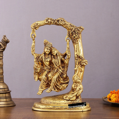 Brassaura™ Pure Brass Radha Krishna Swing – 10.5" Height | 3.10 kg – Divine Tree-Hung Idol for Home Décor