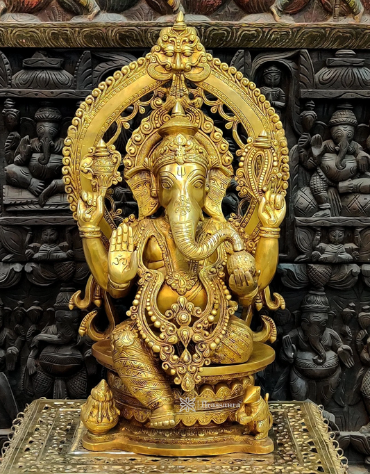 Brassaura™ Brass Ganesha Statue on Round Throne with Prabhavali – 26 Inch Height | 33 Kg | Modak & Mooshak Detailing