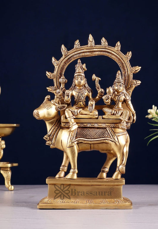 rassaura™ Shiv Parvati Seated on Nandi – Pradosha Nayagar Brass Statue with Prabhavali | 9 Inches Height, 2.25 Kgs Weight