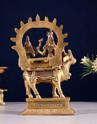 rassaura™ Shiv Parvati Seated on Nandi – Pradosha Nayagar Brass Statue with Prabhavali | 9 Inches Height, 2.25 Kgs Weight