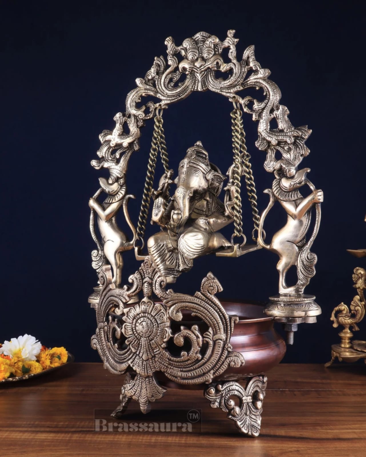 Brassaura™ Lord Ganesha on Swing Brass Urli – 9 kgs, 20 Inches Height – Auspicious Home Decor & Gifting Piece