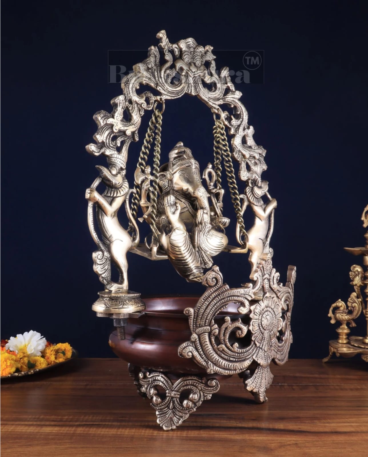 Brassaura™ Lord Ganesha on Swing Brass Urli – 9 kgs, 20 Inches Height – Auspicious Home Decor & Gifting Piece